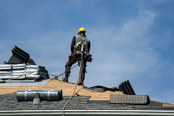 Professional Gutter Installation technician working in Waltham, MA